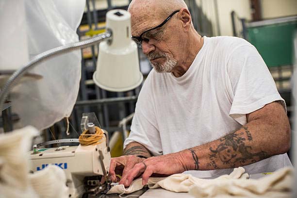 a prisoner learns to sew clothes