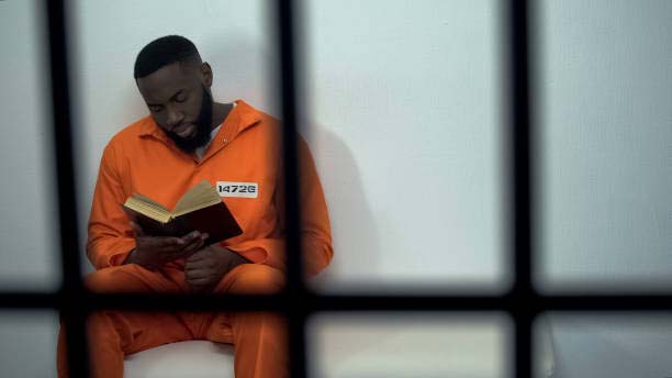an inmate reading book