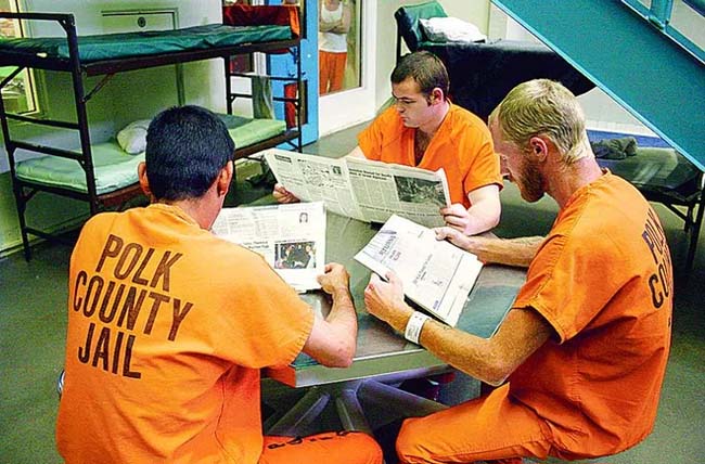 inmate read newspaper